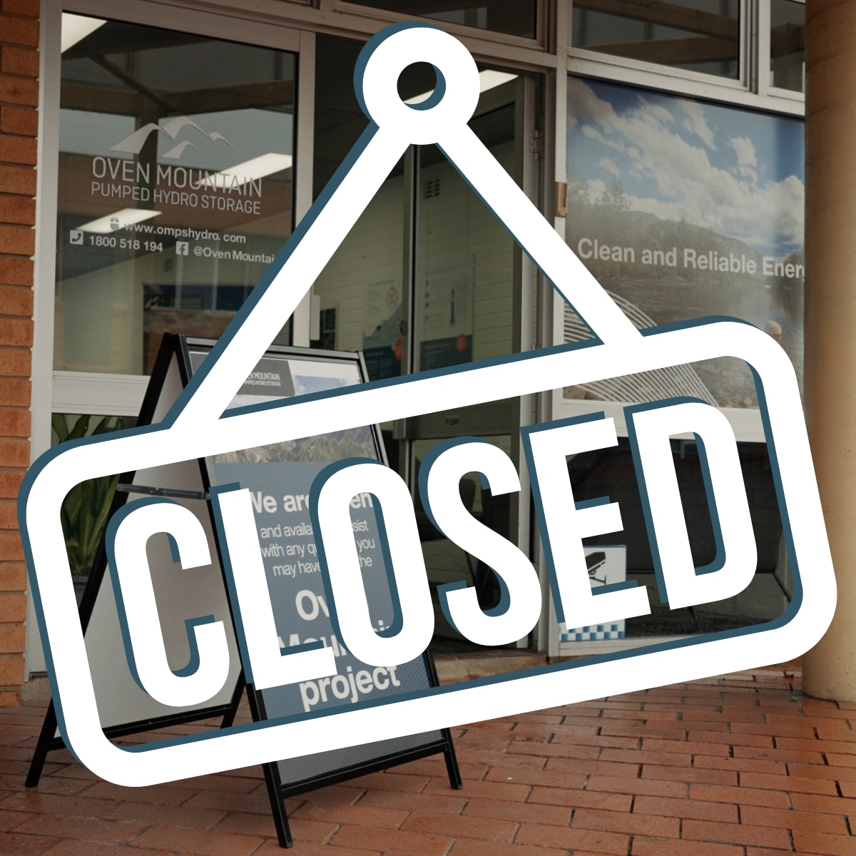 A white 'Closed' sign graphic superimposed over the OMPS community centre facia